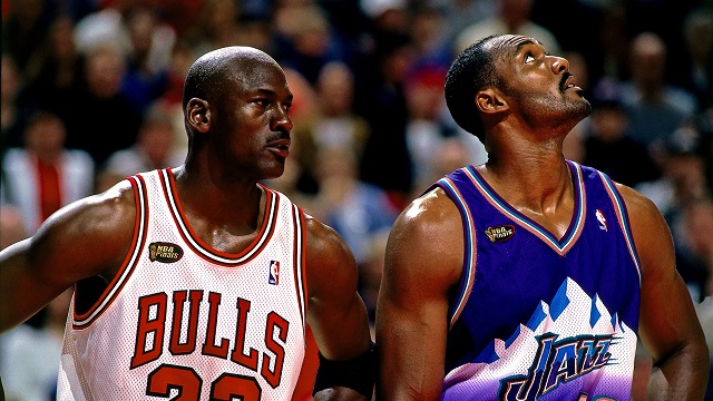 CHICAGO - JUNE 7:  Michael Jordan #23 of the Chicago Bulls matches up against Karl Malone #32 of the Utah Jazz in Game Three of the 1998 NBA Finals at the United Center on June 5, 1998 in Chicago, Illinois.  The Bulls won 96-54.  NOTE TO USER: User expressly acknowledges that, by downloading and or using this photograph, User is consenting to the terms and conditions of the Getty Images License agreement. Mandatory Copyright Notice: Copyright 1998 NBAE (Photo by Andrew D. Bernstein/NBAE via Getty Images)