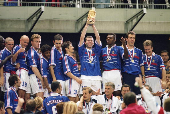 12 Jul 1998:  Joy for France as match winnner Zinedine Zidane lifts the trophy after victory in the World Cup Final against Brazil at the Stade de France in St Denis. Zidane scored twice as France won 3-0.  Mandatory Credit: Ben Radford /Allsport