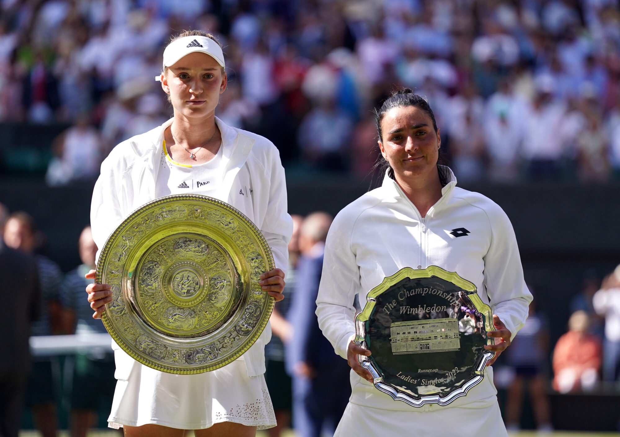 Elena Rybakina (left) with the The Venus Rosewater Dish after defeating Ons Jabeur in The Final of the Ladies' Singles on day thirteen of the 2022 Wimbledon Championships at the All England Lawn Tennis and Croquet Club, Wimbledon. Picture date: Saturday July 9, 2022.